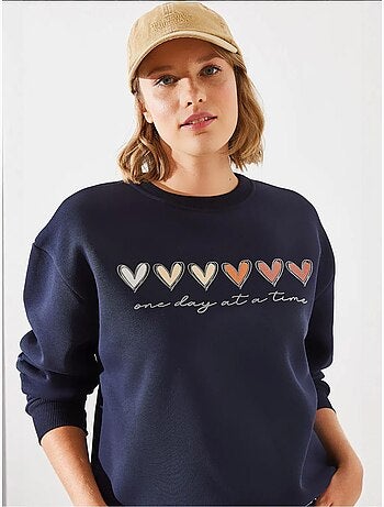 Sudadera de cuello redondo con estampado de corazón lucci