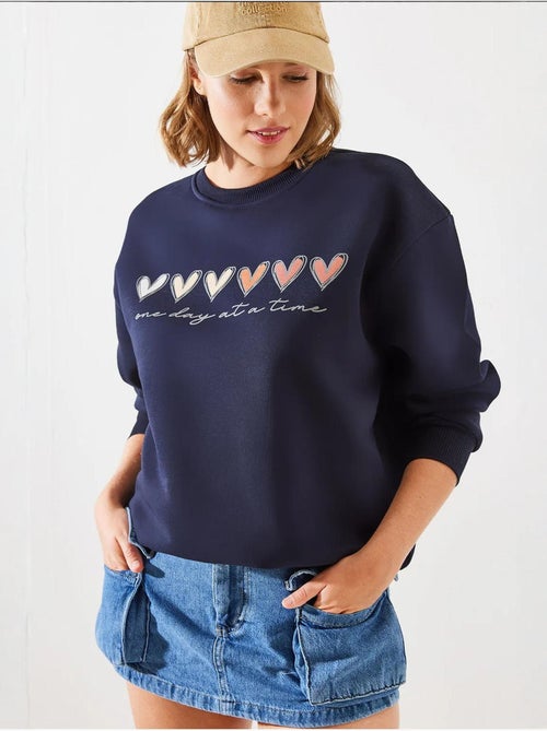 Sudadera de cuello redondo con estampado de corazón lucci - Kiabi