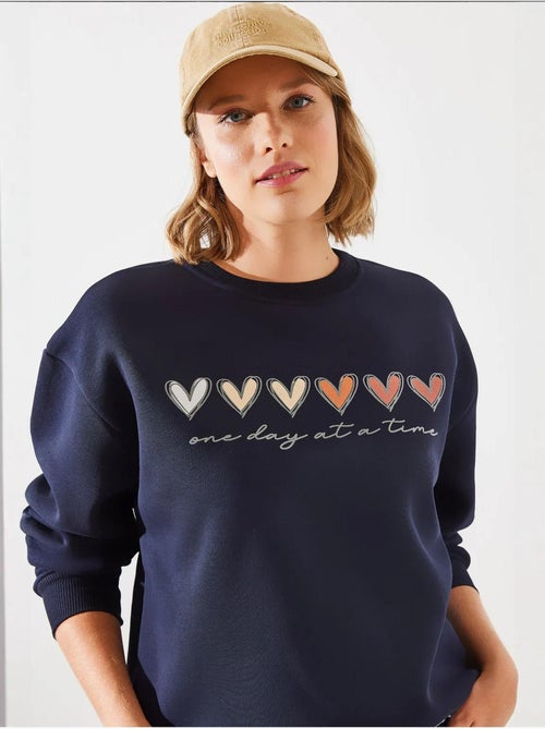 Sudadera de cuello redondo con estampado de corazón lucci - Kiabi