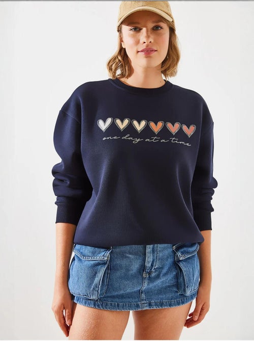 Sudadera de cuello redondo con estampado de corazón lucci - Kiabi