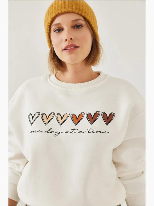 Sudadera de cuello redondo con estampado de corazón lucci - Kiabi