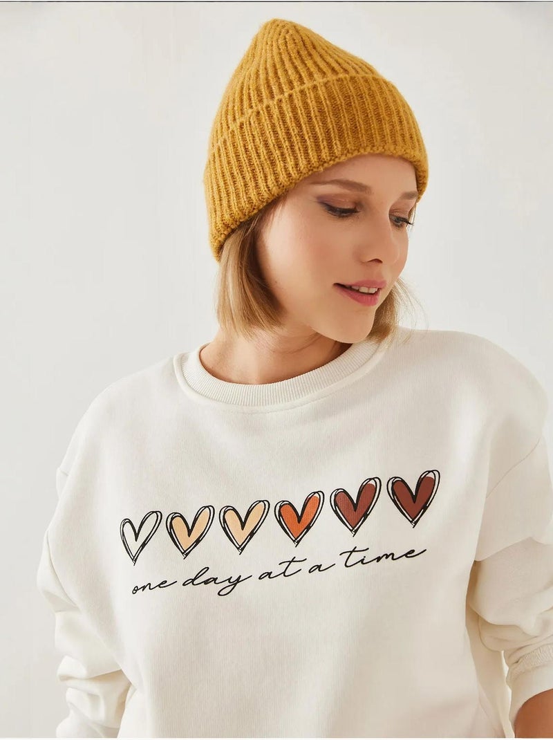Sudadera de cuello redondo con estampado de corazón lucci Blanco - Kiabi