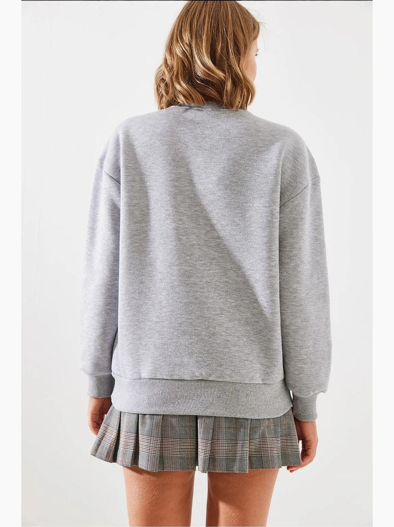 Sudadera de cuello redondo con estampado de corazón lucci Gris claro - Kiabi