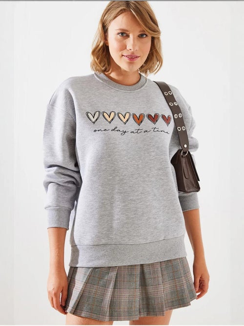 Sudadera de cuello redondo con estampado de corazón lucci - Kiabi
