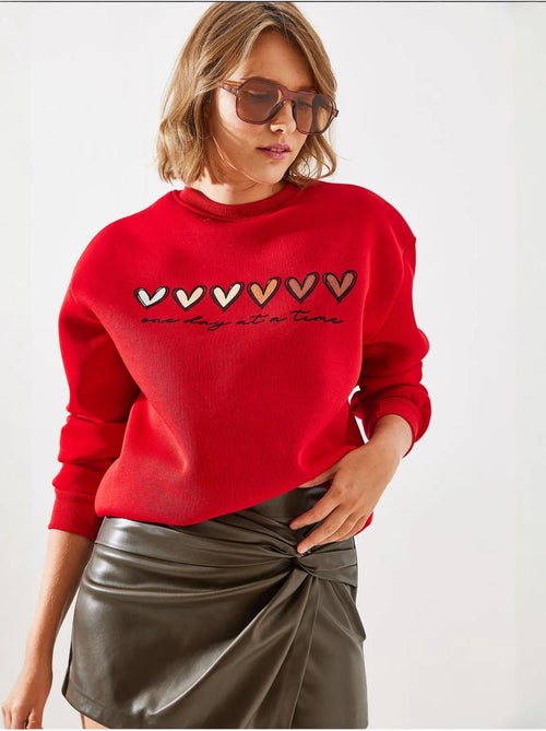 Sudadera de cuello redondo con estampado de corazón lucci - Kiabi