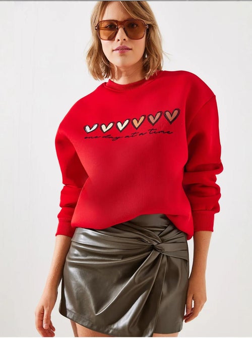 Sudadera de cuello redondo con estampado de corazón lucci - Kiabi