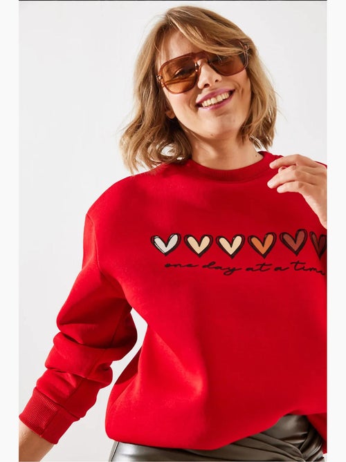 Sudadera de cuello redondo con estampado de corazón lucci - Kiabi