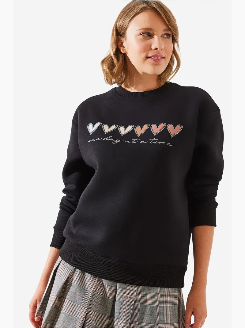 Sudadera de cuello redondo con estampado de corazones lucci Negro - Kiabi