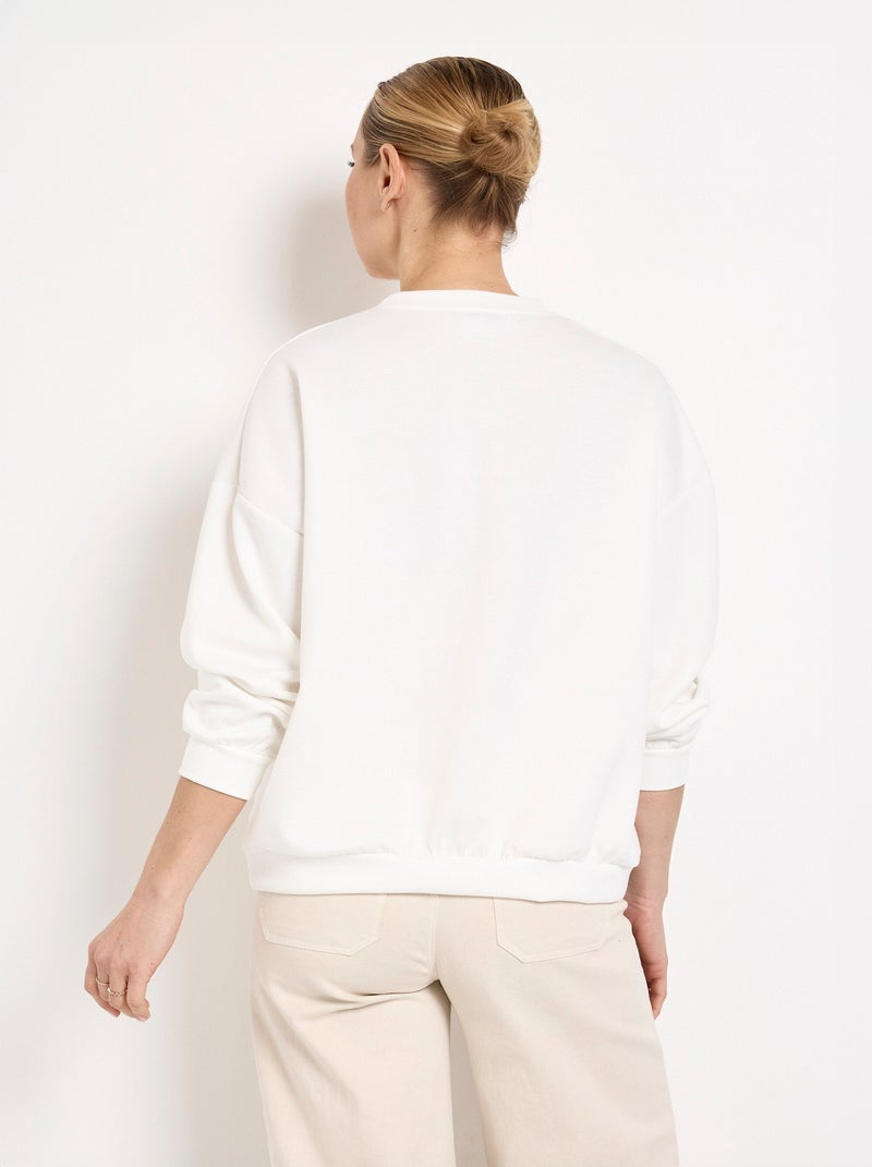 Sudadera de cuello redondo con estampado naranja en punto suave. - AFIBEL Blanco - Kiabi