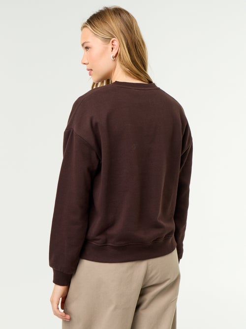 Sudadera de cuello redondo con inscripción delantera - Kiabi Sudadera de cuello redondo con inscripción delantera - Kiabi