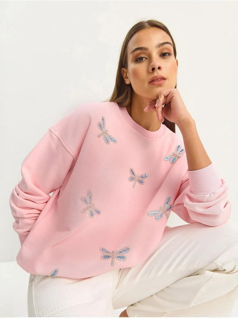 Sudadera de cuello redondo con libélulas bordadas lucci Rosa almendra - Kiabi