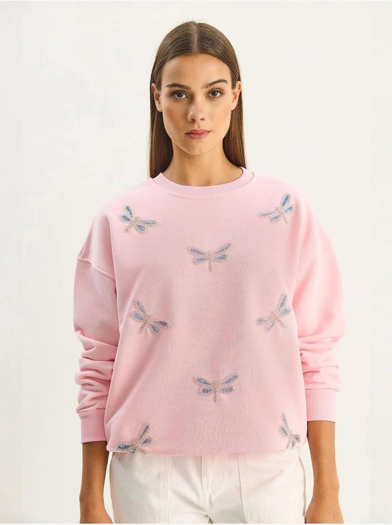 Sudadera de cuello redondo con libélulas bordadas lucci Rosa almendra - Kiabi