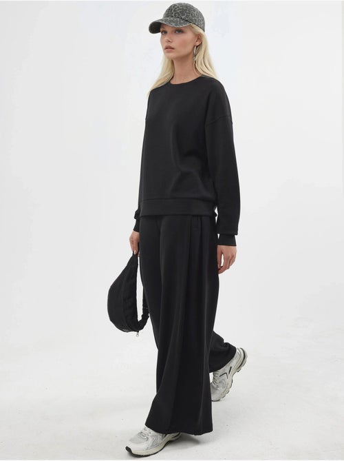Sudadera de cuello redondo de corte relajado busem - Kiabi Sudadera de cuello redondo de corte relajado busem - Kiabi