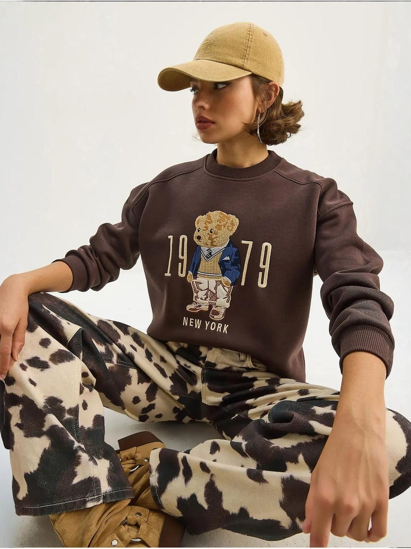 Sudadera de cuello redondo estampada y corte relajado lucci Marrón chocolate - Kiabi