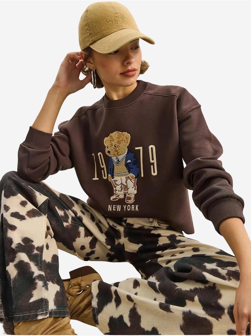 Sudadera de cuello redondo estampada y corte relajado lucci Marrón chocolate - Kiabi
