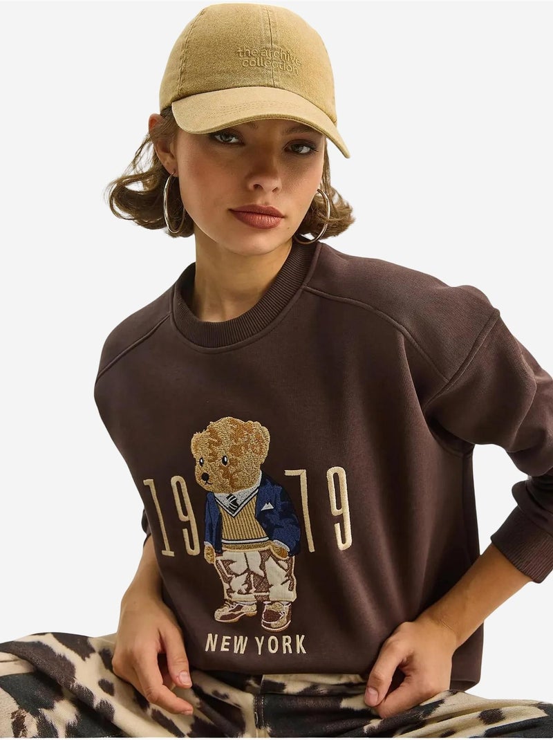 Sudadera de cuello redondo estampada y corte relajado lucci Marrón chocolate - Kiabi