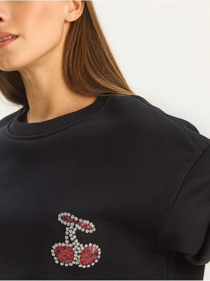 Sudadera de cuello redondo y corte relajado con bordado lucci Negro - Kiabi