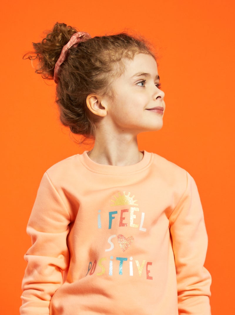 Sudadera de felpa con estampado de fantasía NARANJA - Kiabi