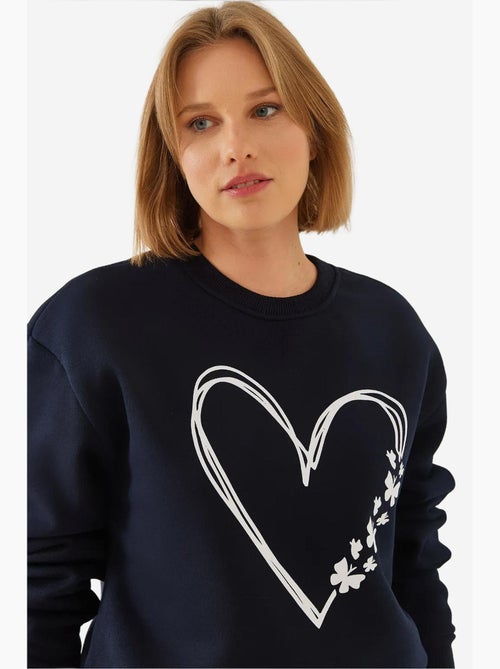 Sudadera de hilo cepillado con cuello redondo y detalle de corazón estampado lucci - Kiabi