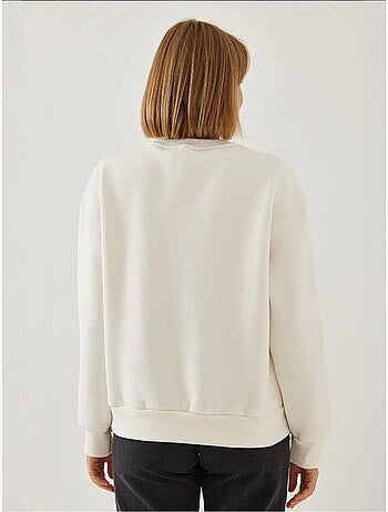 Sudadera de hilo cepillado con cuello redondo y detalle de corazón estampado lucci