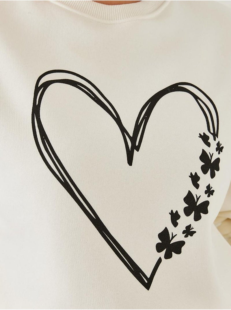 Sudadera de hilo cepillado con cuello redondo y detalle de corazón estampado lucci Beige arcilla - Kiabi
