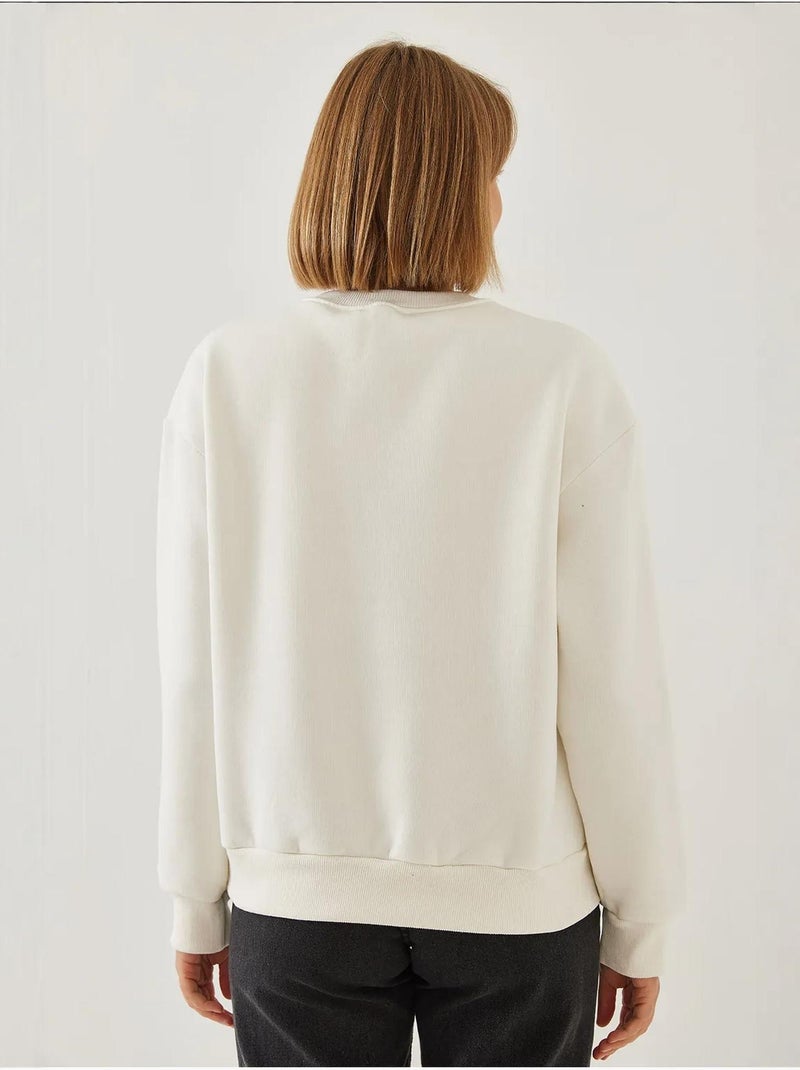 Sudadera de hilo cepillado con cuello redondo y detalle de corazón estampado lucci Beige arcilla - Kiabi