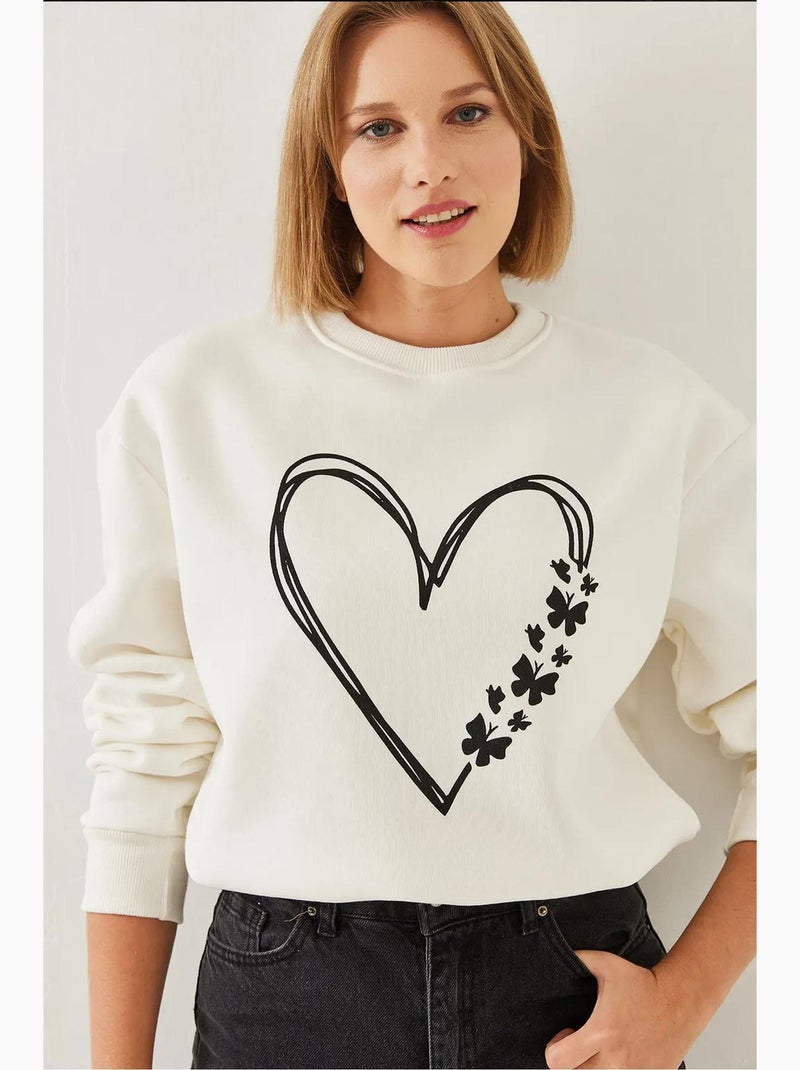 Sudadera de hilo cepillado con cuello redondo y detalle de corazón estampado lucci Beige arcilla - Kiabi