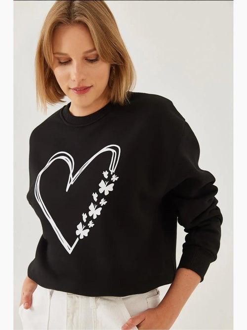 Sudadera de hilo cepillado con cuello redondo y detalle de corazón estampado lucci - Kiabi Sudadera de hilo cepillado con cuello redondo y detalle de corazón estampado lucci - Kiabi