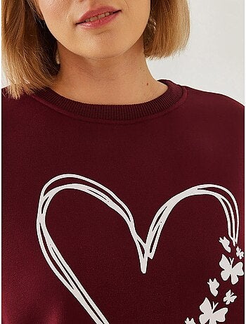 Sudadera de hilo cepillado con cuello redondo y detalle de corazón estampado lucci
