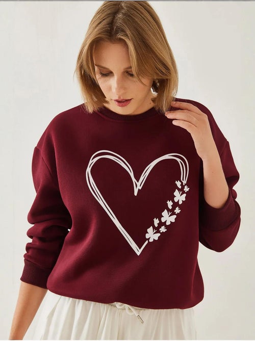 Sudadera de hilo cepillado con cuello redondo y detalle de corazón estampado lucci - Kiabi