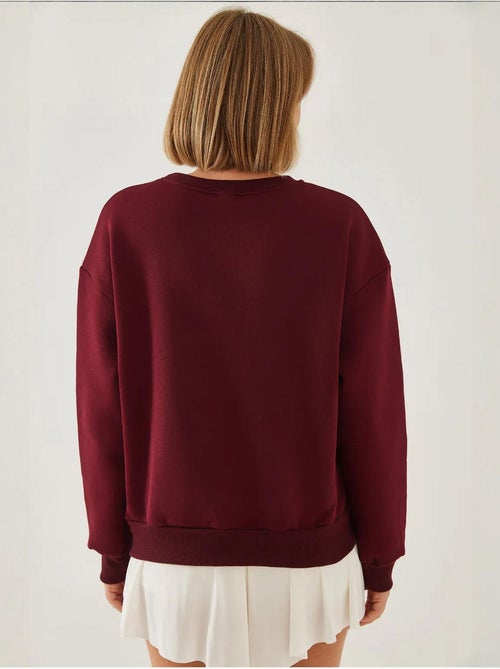Sudadera de hilo cepillado con cuello redondo y detalle de corazón estampado lucci - Kiabi