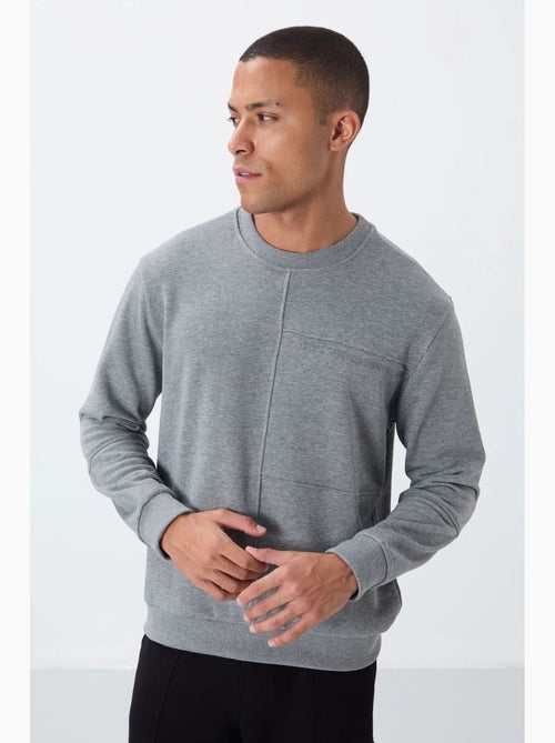 Sudadera de hombre lisa con cuello redondo tommy - Kiabi Sudadera de hombre lisa con cuello redondo tommy - Kiabi