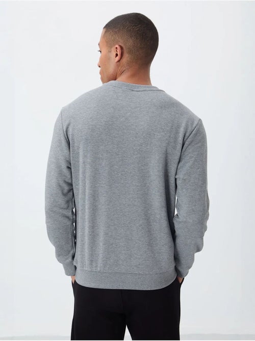 Sudadera de hombre lisa con cuello redondo tommy - Kiabi Sudadera de hombre lisa con cuello redondo tommy - Kiabi