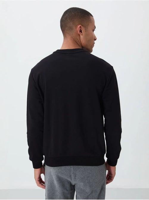 Sudadera de hombre lisa con cuello redondo tommy - Kiabi Sudadera de hombre lisa con cuello redondo tommy - Kiabi