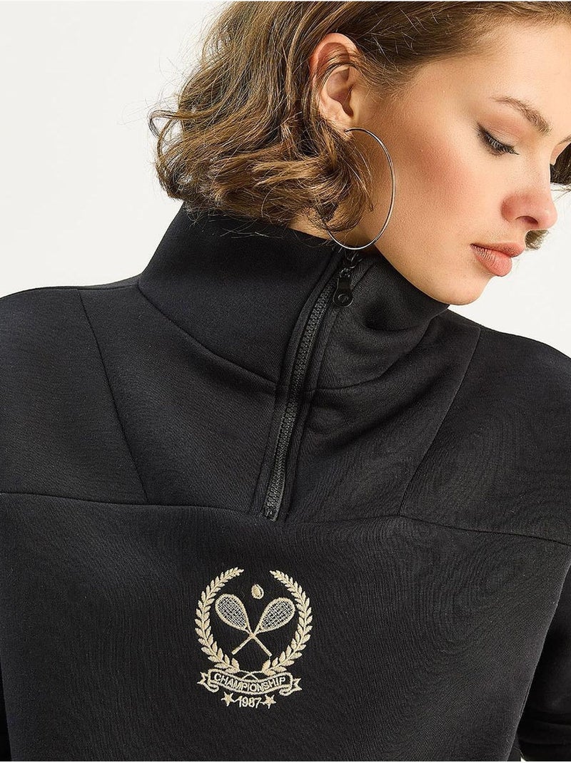Sudadera de manga larga con cuello de cremallera y bordado lucci Negro - Kiabi