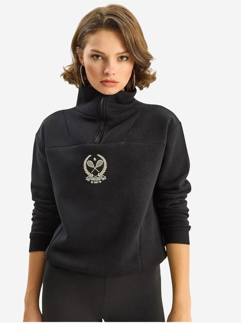 Sudadera de manga larga con cuello de cremallera y bordado lucci Negro - Kiabi