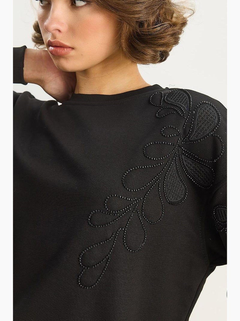Sudadera de manga larga con cuello redondo bordada lucci Negro - Kiabi