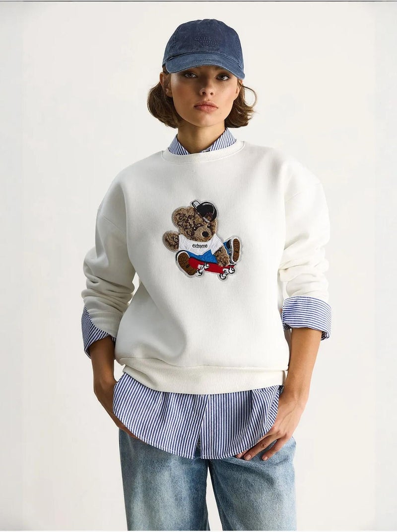 Sudadera de manga larga con cuello redondo y bordado lucci Blanco - Kiabi