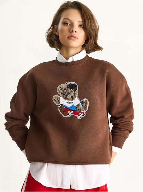 Sudadera de manga larga con cuello redondo y bordado lucci - Kiabi Sudadera de manga larga con cuello redondo y bordado lucci - Kiabi