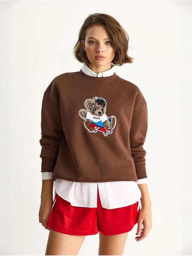 Sudadera de manga larga con cuello redondo y bordado lucci Marrón chocolate - Kiabi