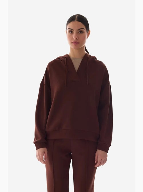 Sudadera de textura sedosa, cuello en v y manga larga penti - Kiabi Sudadera de textura sedosa, cuello en v y manga larga penti - Kiabi