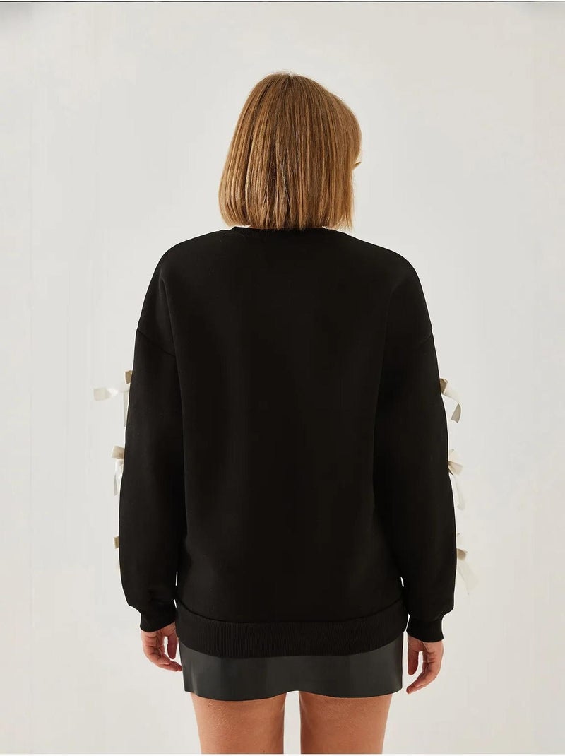 Sudadera de tres hilos cepillados con mangas con lazo lucci Negro - Kiabi