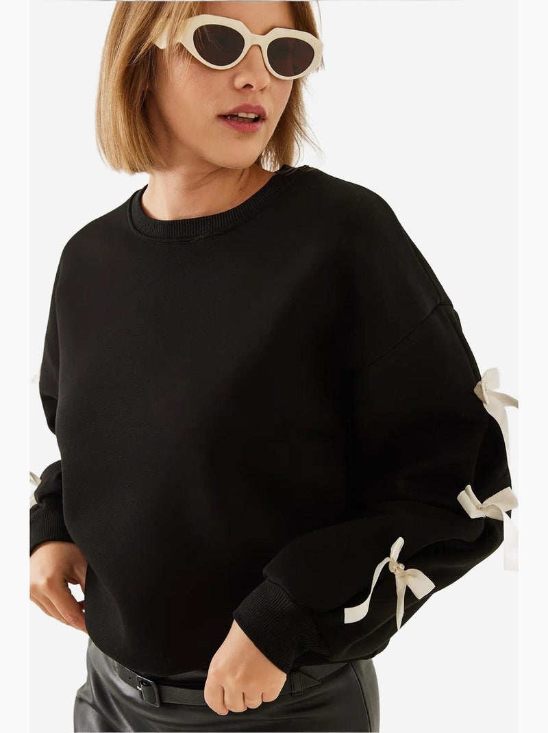 Sudadera de tres hilos cepillados con mangas con lazo lucci Negro - Kiabi