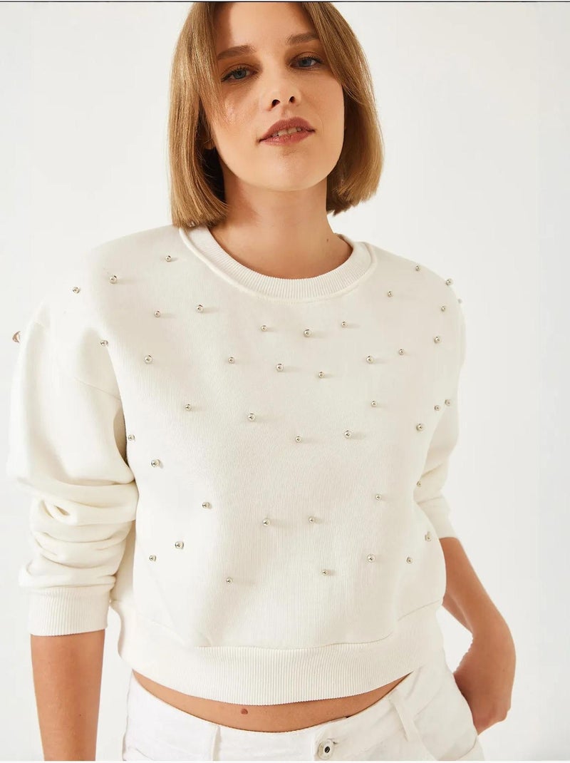 Sudadera de triple hilo cepillado con tachuelas de perlas y cuello redondo lucci Crema - Kiabi