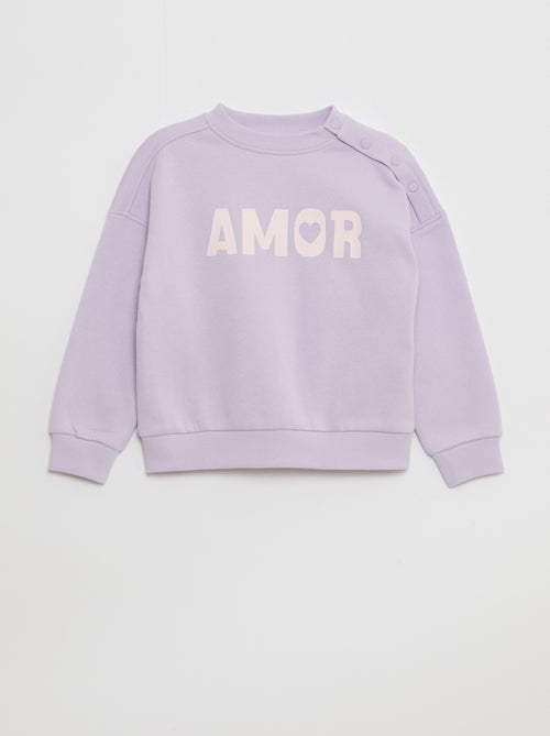 Sudadera estampada con botones a presión imantados en el hombro - So Easy - Kiabi Sudadera estampada con botones a presión imantados en el hombro - So Easy - Kiabi