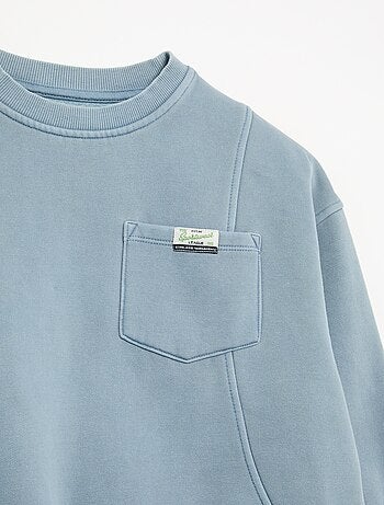Sudadera holgada con cortes y bolsillo en el pecho
