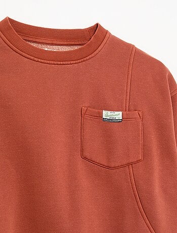 Sudadera holgada con cortes y bolsillo en el pecho