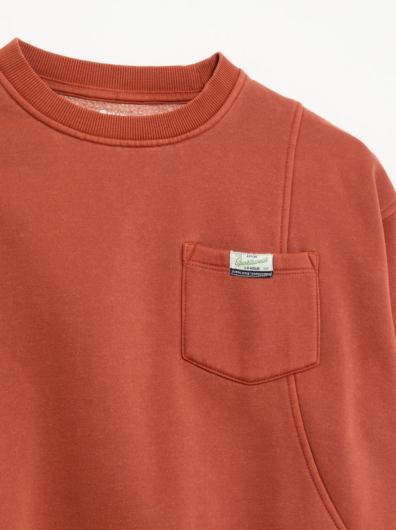Sudadera holgada con cortes y bolsillo en el pecho Naranja - Kiabi