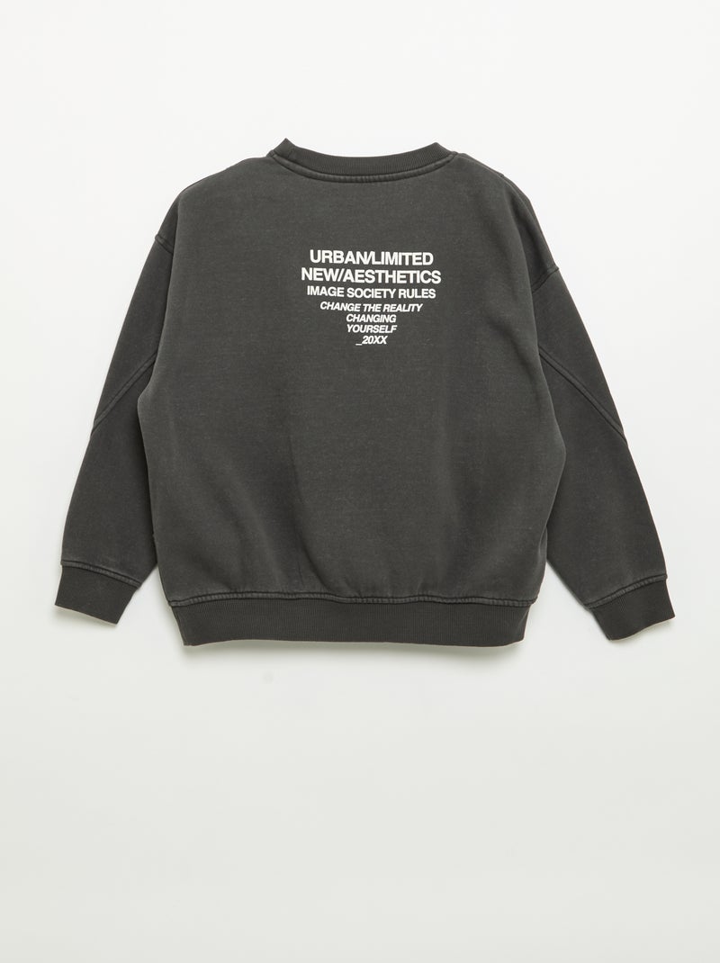 Sudadera holgada con cortes y bolsillo en el pecho Negro - Kiabi