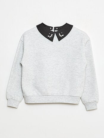 Sudadera holgada con cuello de strass